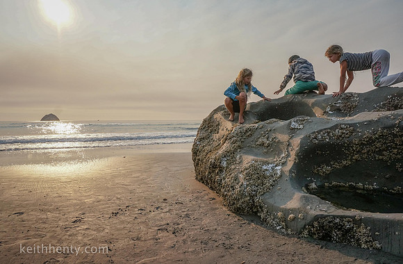Children playing on rock, Del Norte County, CA