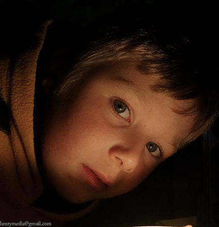 Boy in candle light