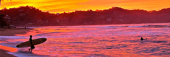 Surfer at sunset, Sayulita Mexico
